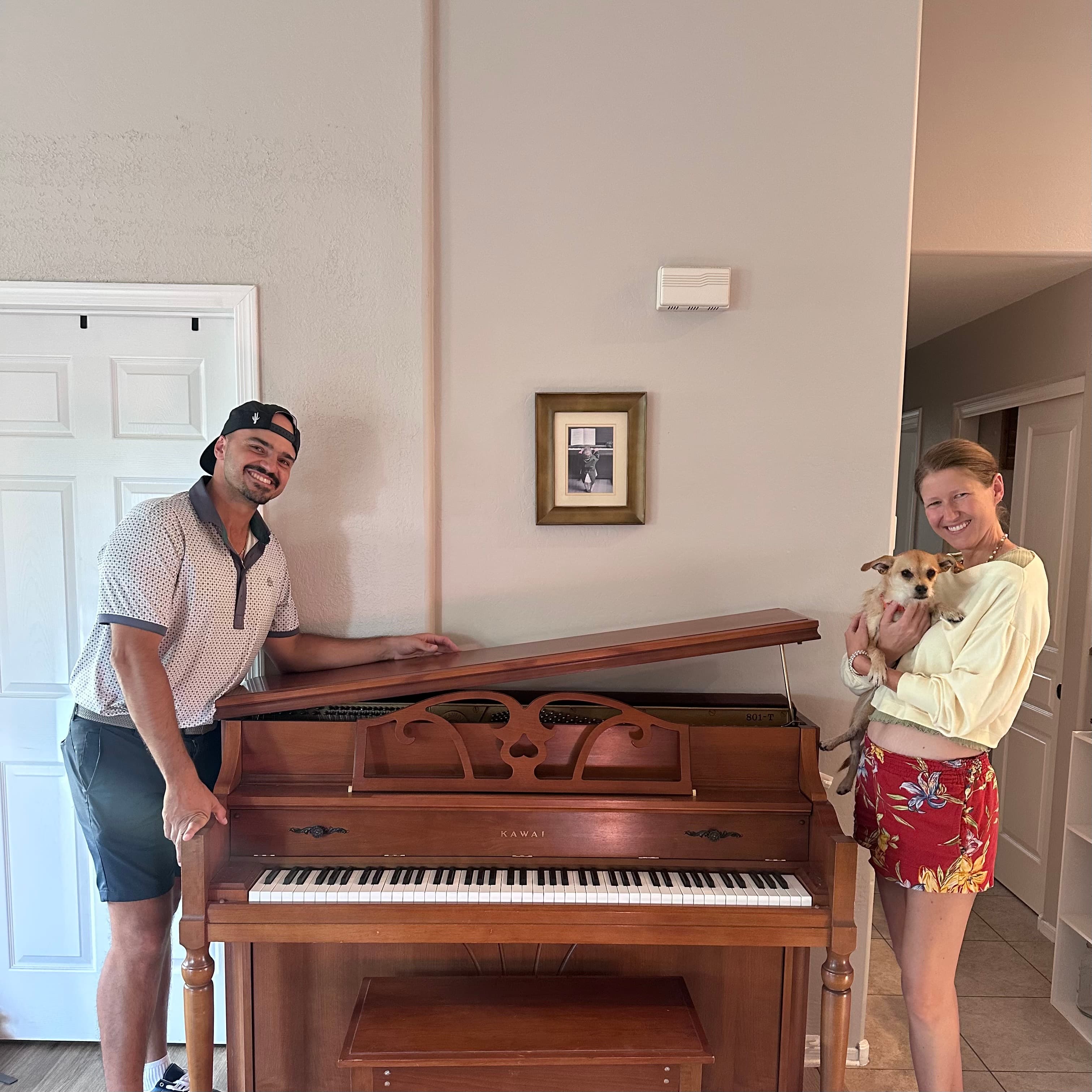 Carmine and Jenny L. with the second piano donated to 88 Again